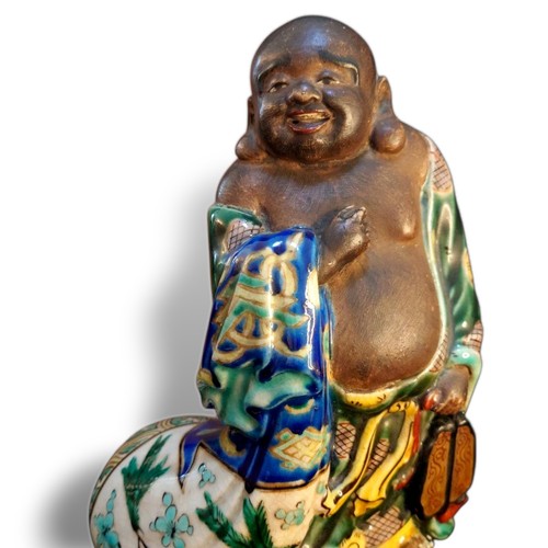 Antica statua ceramica dio