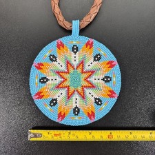 Collana medaglione di perline