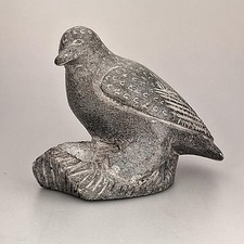 Scultura uccellino pietra