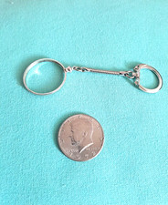 1 portachiavi nuovo con moneta half dollar anno 1972 usata compresa.