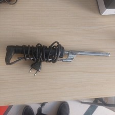 piastra per capelli vintage