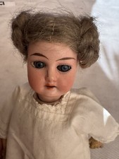 Antica bambola testa di