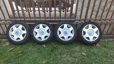 4 cerchi  in lega 16" originali VW per New Beetle  1C0601025A con coprimozzi.