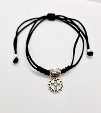 CRUZ ORLADA PULSERA