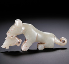 Statua pesce mangia tigre