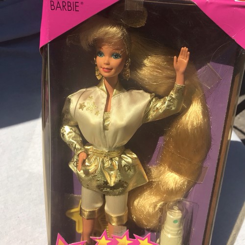Barbie bambola capelli