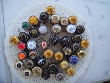 SPUMANTE/CHAMPAGNE tappi sughero con capsule e gabbiette oltre 40 pezzi