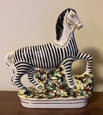 Antica figura zebrata ceramica