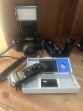 Canon A-1 Reflex Auto-Manual FD 50mm f1,4 + flash + motor drive .. condizioni ?