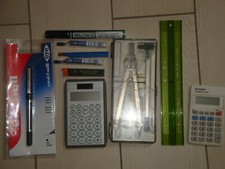 Lotto di 10 articoli ufficio cartoleria- Penne,calcolatrice,compasso,normografo