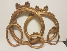 Cornice ovale in legno foglia