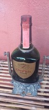 Bottiglia Oro Pilla Brandy con portabottiglia basculante. Vintage da collezione