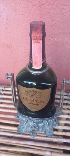 Bottiglia oro pilla brandy - bottiglia,