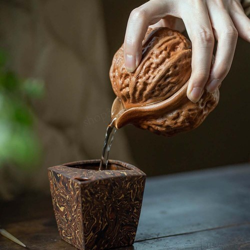 Tazza teiera fatta - , mano