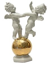 Antica statuina in porcellana