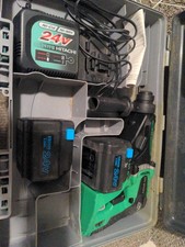 Trapano a percussione rotativo