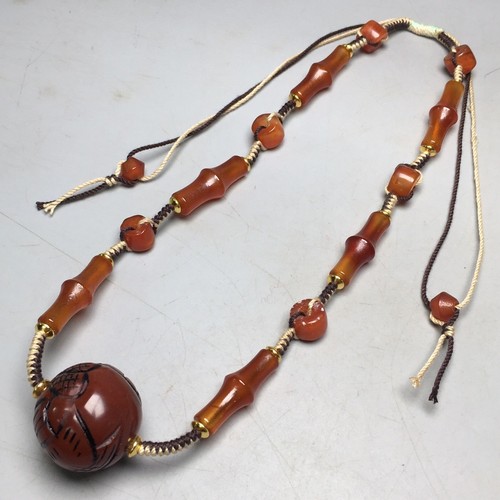 Collana amuleto perle