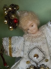 Squisita antica bambola di