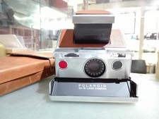 Polaroid sx70 con - [nc],