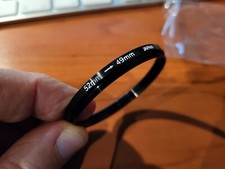 ANELLO DI RACCORDO PER FILTRI - STEPPING RING 52mm - 49 mm