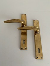 Coppia di antiche maniglie per