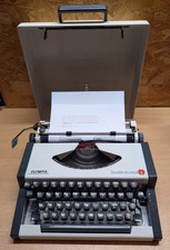Vintage Olympia Traveller De Luxe S Typewriter with Cover