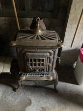 stufa a legna in ghisa usata