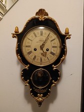 Orologio a pendolo da parete