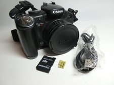 Canon PowerShot S5IS AA batteria 8MP 12x IS zoom fotocamera digitale bridge **LEGGI**