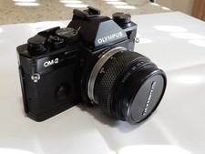 Olimpus OM2 spot program  +