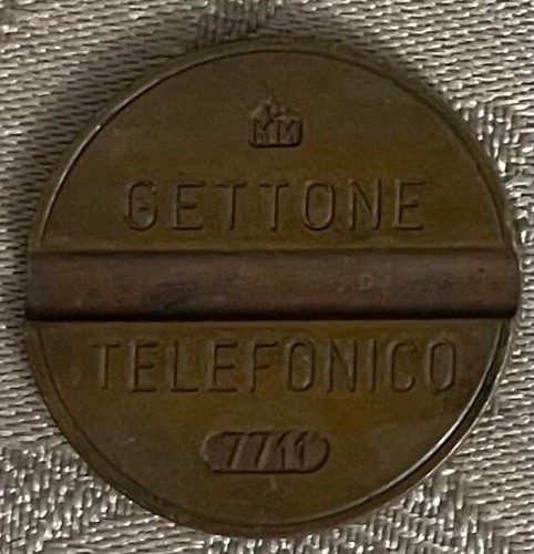 Gettone telefonico 7711 - gettone,