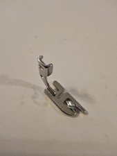 Piedino pressa orlo arrotolato