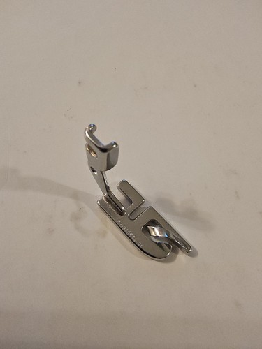 Piedino pressa orlo arrotolato