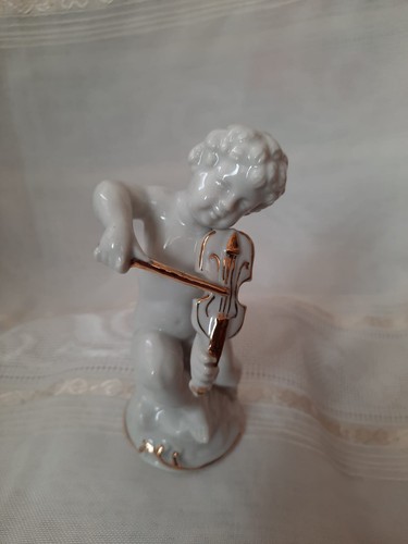 Putti musicanti in - putti,