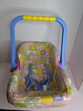 Bambola porta seggiolino auto