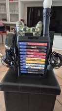Torre di ricarica, porta giochi e accessori per PlayStation 4.