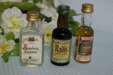 TRE BOTTIGLIE MIGNON VINTAGE DI SAMBUCA CASONI AMARETTO AMARISCHIA AMARO RADIS