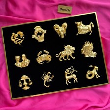 Spilla Zodiaco Schiaparelli