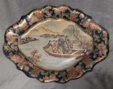 Piatto ovale dorato dipinto a
