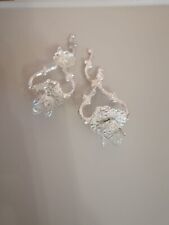 Coppia di oggetti argentati