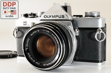 OLYMPUS OM-1 MD con F.ZUIKO