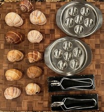 Set piatti e conchiglie pinze