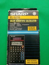 Calcolatrice scientifica solare vintage Sharp EL-520 con manuale