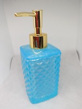 Set bagno con dispenser sapone e portaspazzolino da appoggio in resina