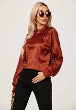 Top blusa a maniche lunghe in