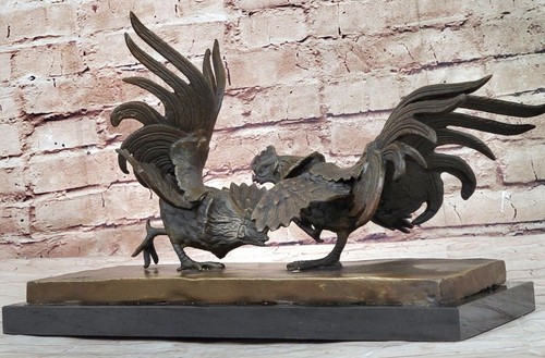 Coppia galli statuine - di,