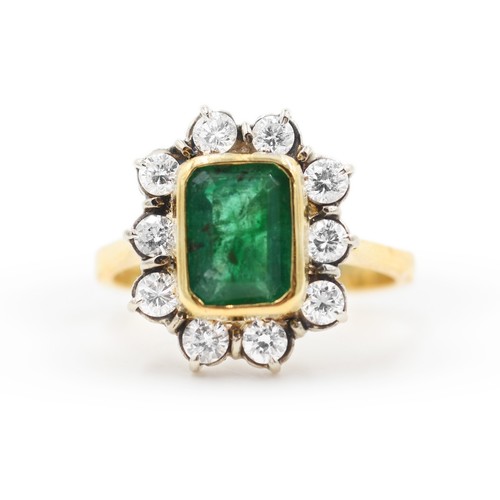 White gold ring with - , emerald