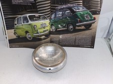 FIAT 600 MULTIPLA DEL 62 - FARO DX = SX COMPLETO DI  CORNICE ORIGINALE CARELLO