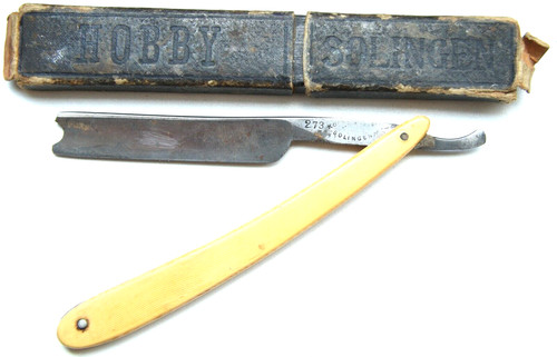 Antico rasoio dritto marcato