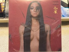 Album analogico Awich Peacock